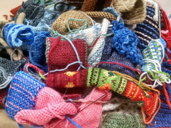 Big jumble of knitted swatches