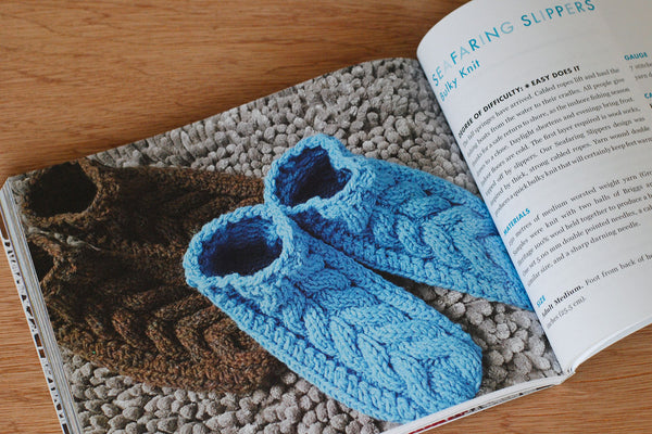 A photo of the Seafaring bulky cabled slipper pattern in Saltwater Gifts