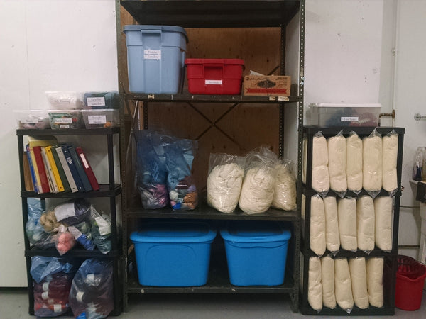 Undyed yarn on shelves