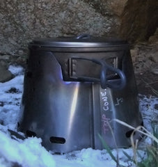 Lance James showing off his Evernew 900ml + Sidewinder Ti-Tri fighting off -1deg C while camping on the North Yorkshire moors.