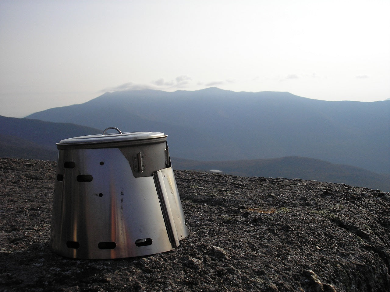 Gregory Marsh with his Sidewinder enjoying a warm beverage after finishing a sunrise photography session of Mount Lafayette and Franconia Ridge (background)