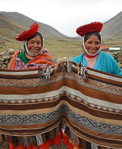 Santusa Cjuro Castille (left) and Demesia Sinchi Echami (right) worked together to create this stunning Alejandro poncho! Because of the size and time involved in weaving ponchos, the women work in pairs with friends and relatives of their communities