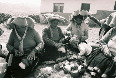 Weavers from the community of Uppis. Photography by Giulia Grassi