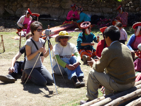 Louise Martindale films, while Urbano Huayna translates, during an interview with Master Weaver Daniel Sonqo of Parobabma