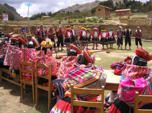 Chaullacocha & Chupani weavers (foreground) listen to the Chayhautire weaver's presentation