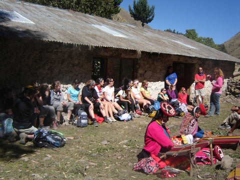 Project Leader Terra Fuller introduces weavers of Rumira Sondormayo to students of Hathaway Brown School.