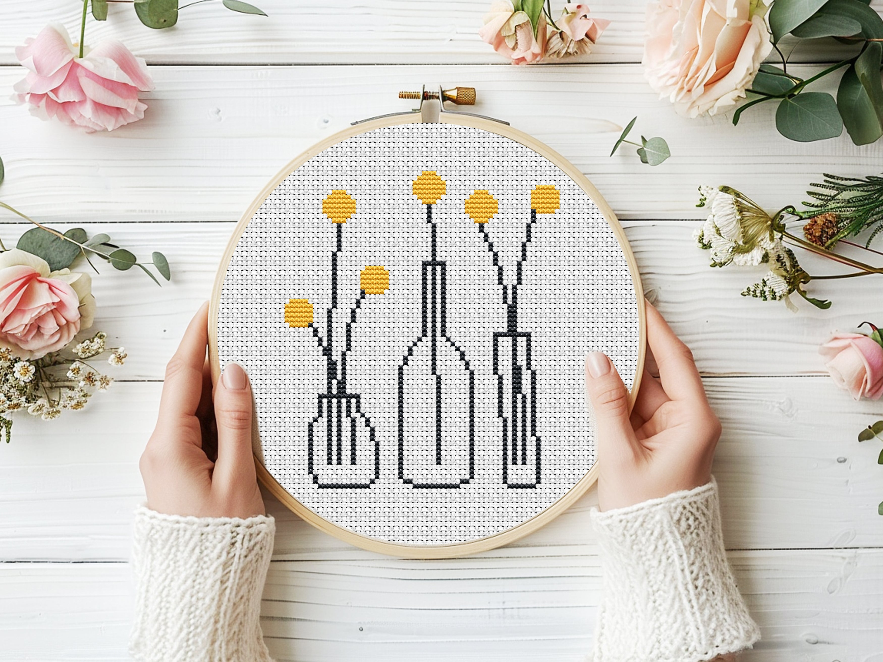 yellow flowers in outline pots cross stitch pattern, minimalist beginner embroidery on white background