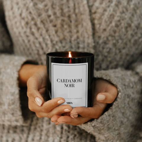 A natural soy wax candle that uses essential oils to create a warm, deep scent with notes of Cardamom and Cedarwood.