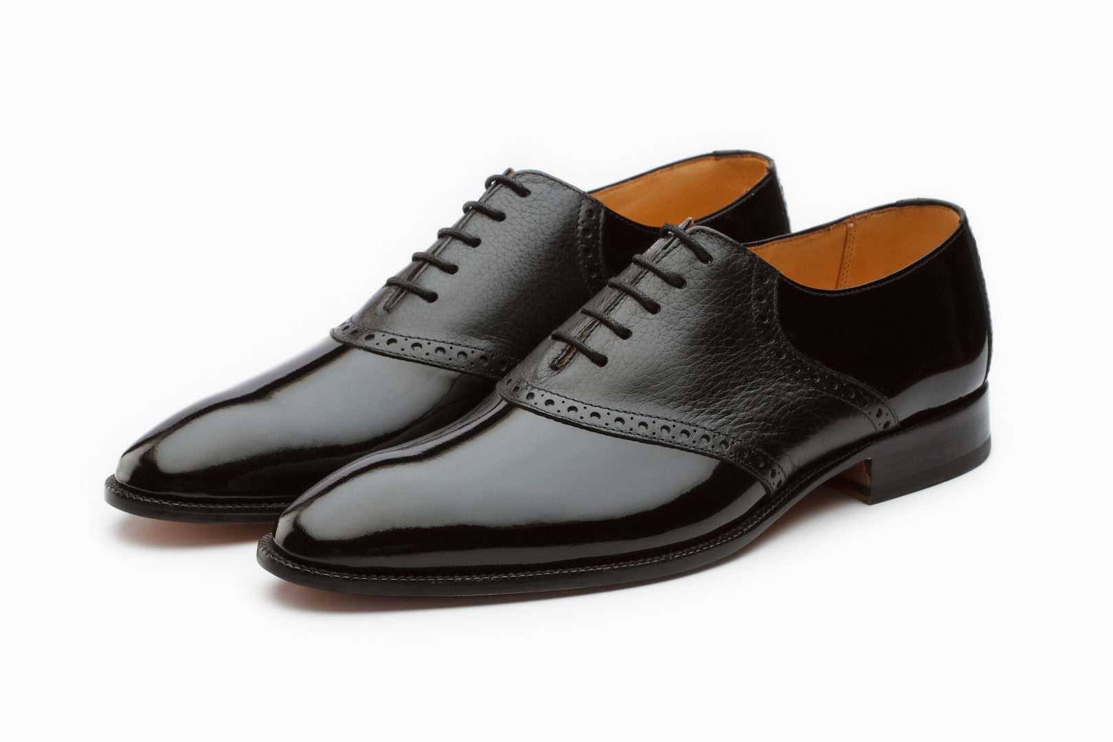 black and grey saddle oxfords