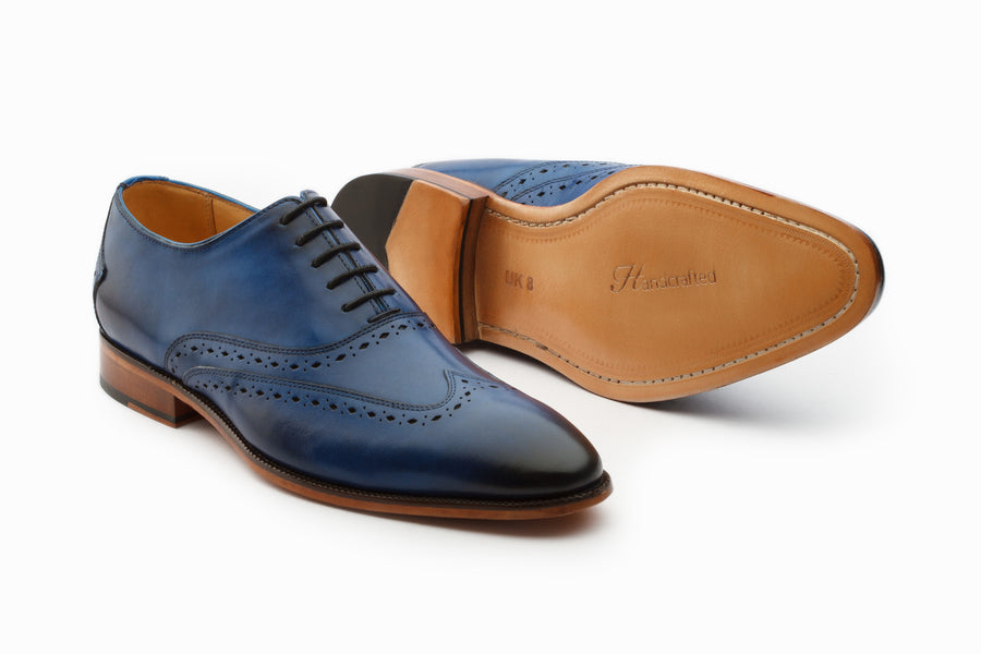 blue wingtip oxford shoes