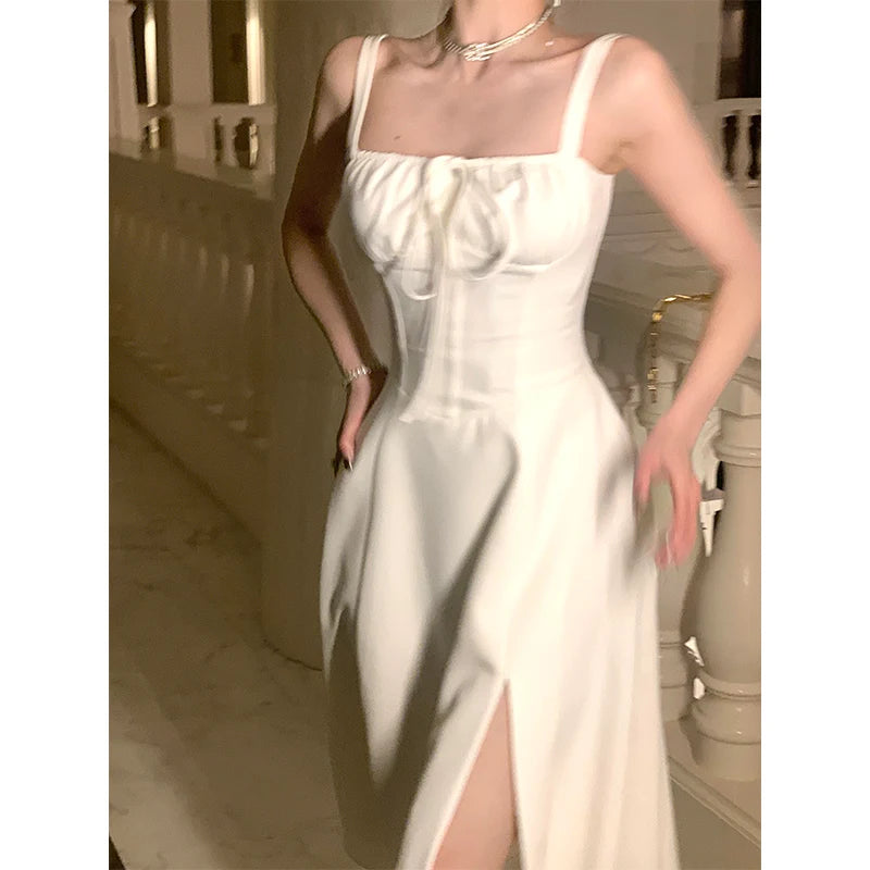 Elegant White Midi Dress with Sleeveless Lace-Up Detail - Image 4
