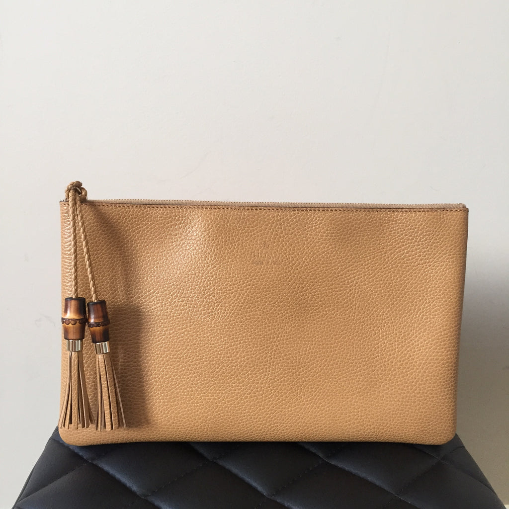 light tan clutch