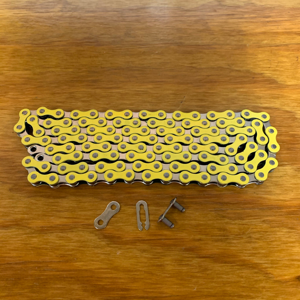 yellow bmx chain