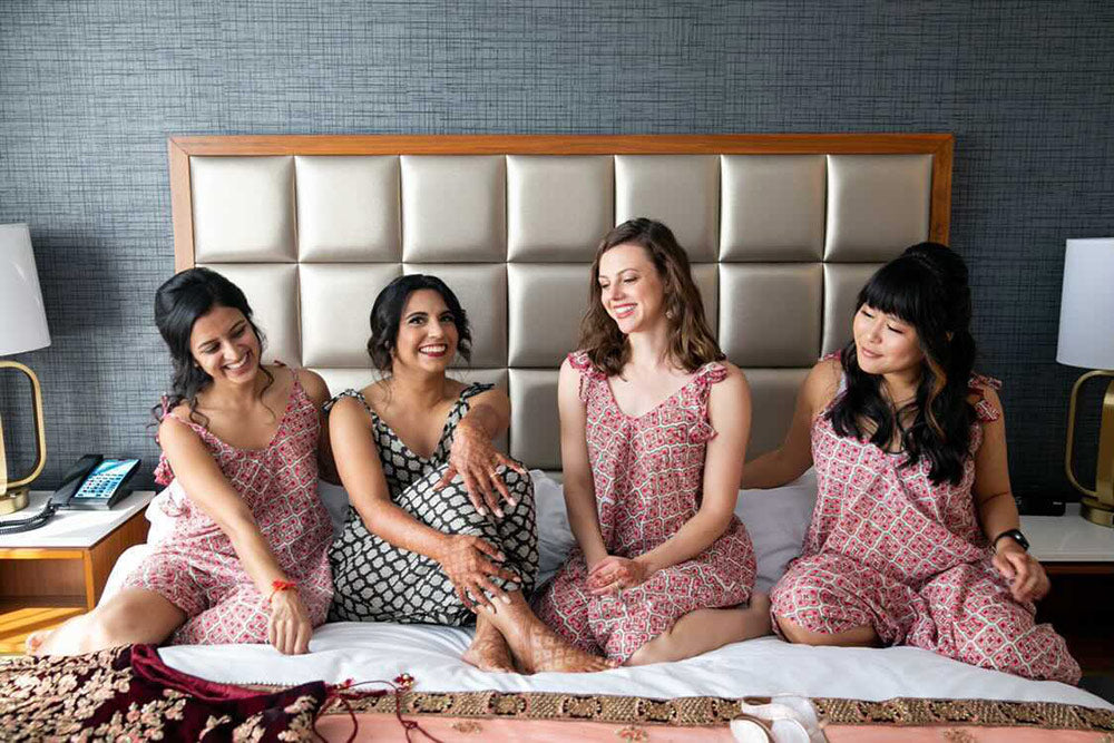 bride with bridesmaids in rompers