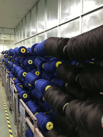 Millons of meters of thread for high volume clothing production