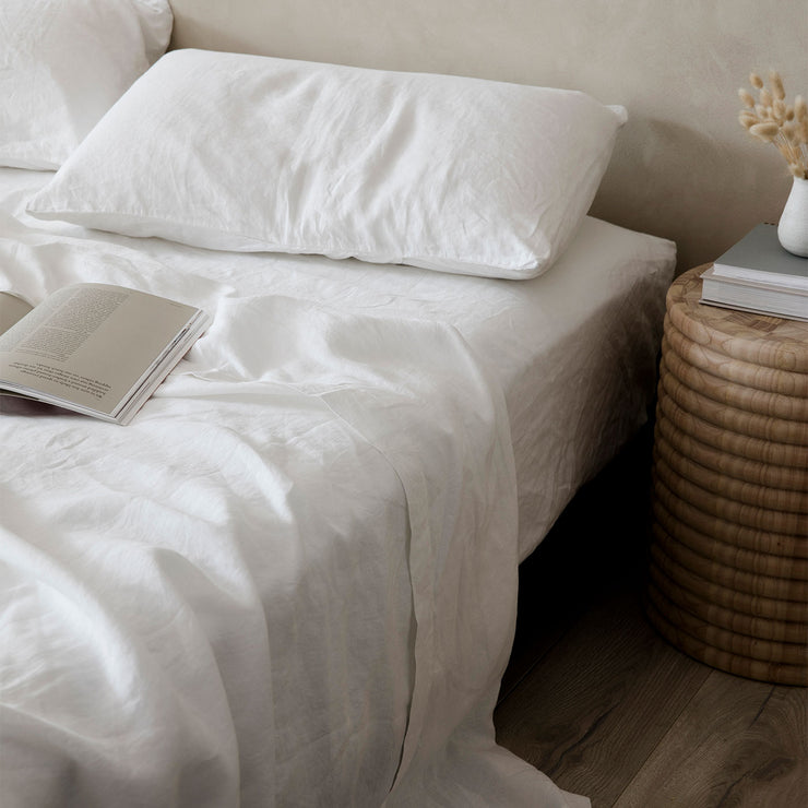 white bed sheets and pillowcases