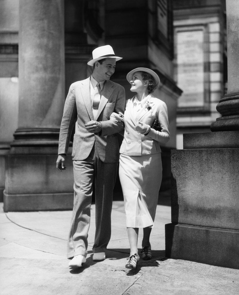 1930s Couple In Suits And Hats Walking Arm In Arm Posters Prints By Corbis