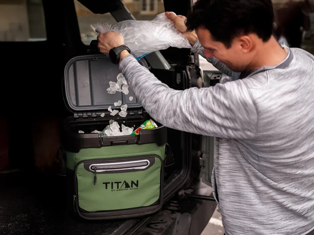 Titan cooler in the back of a truck with camping gear