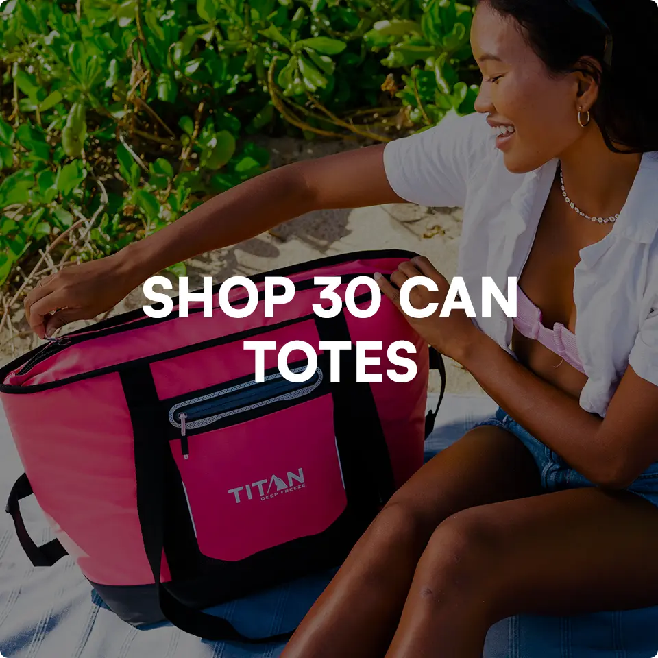 Woman on beach with 30 Can Cooler Tote