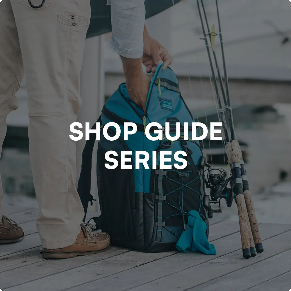 Person reaching into a backpack cooler while getting ready to fish