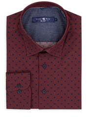 Burgundy button-up, long-sleeve shirt with navy blue polka dots.
