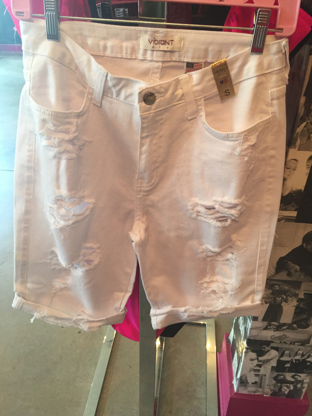 white distressed bermuda shorts