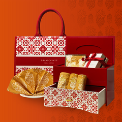 Explore the exquisite Set A from the collaboration between Batik Boutique and Grand Hyatt, showcasing an ensemble of delights, including authentic batik serviette and coasters, a stylish tote bag, jewelry box, and a box of delectable chocolate pralines