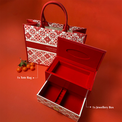 Chinese New Year collaboration with Batik Boutique: Jewelry box and tote bag showcased against a vibrant red background