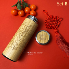 Grand Hyatt and Batik Boutique Collaboration: A wooden tumbler adorned with a batik-inspired motif showcased against a bold red background, adding a touch of elegance to your experience