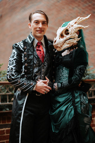 Kate and Baxter Durham at their gothic Halloween dinosaur themed wedding at North Carolina Museum of Natural Science