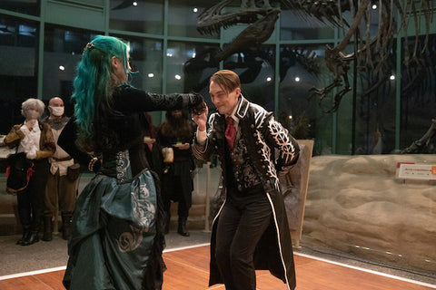 Baxter & Kate on the dance floor at their gothic halloween dinosaur wedding at the North Carolina Museum