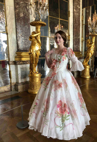 Senra Aria at Versailles in Paris wearing her cosplay gown from the end of the Marie Antoinette 2017 film