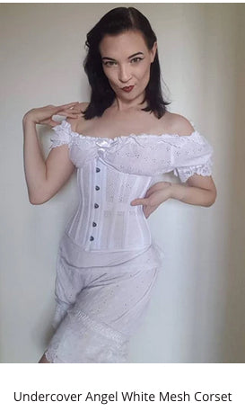 Burlesque and aerial performer La Petite Morticia in the Undercover Angel white mesh corset