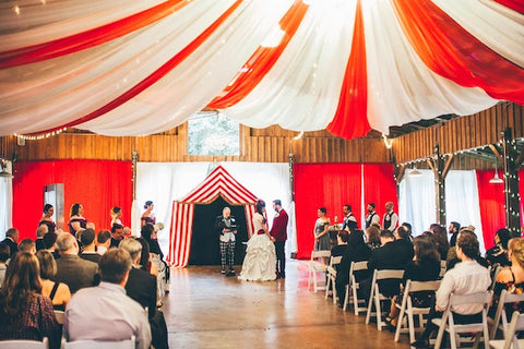 Julia and Curtis being married Under the Big Top at their The World's Greatest Showman Wedding in the US