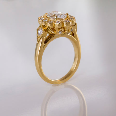 Gold ring designed by Ellie Lee Fine Jewelry features diamonds and nature-inspired design elements