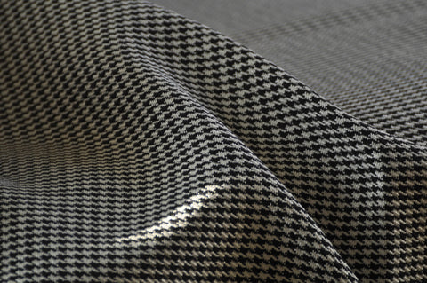 THE ORIGINS OF THE HOUNDSTOOTH PATTERN