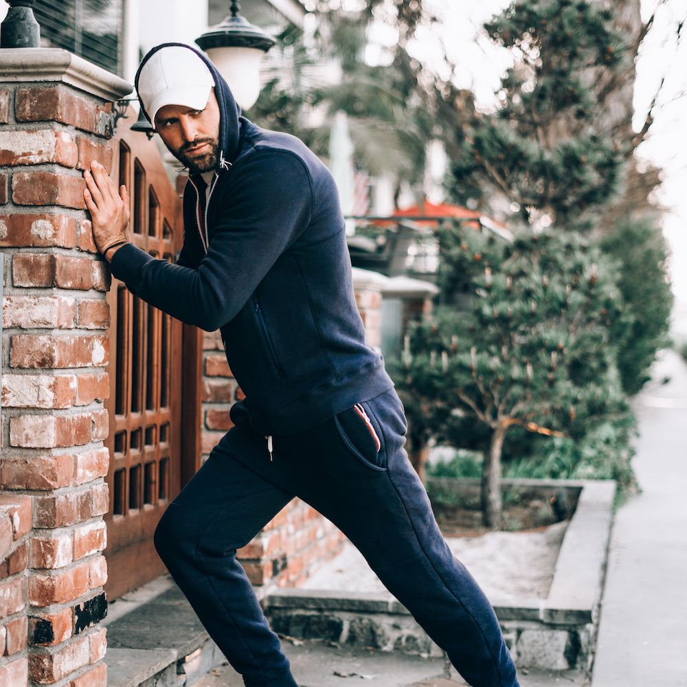 Robbie Hayes in Navy Rush Jogger and Rush Hoodie