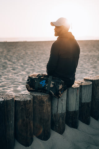 Robbie Hayes in Rush Hoodie with Camo Duffel