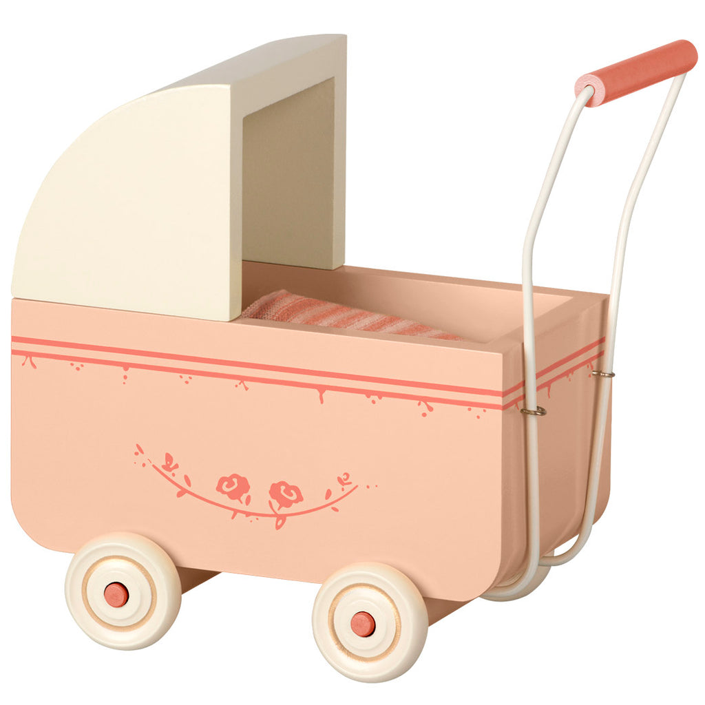 pink wooden pram