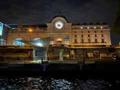 Musee d'Orsay in Paris at night from river boat