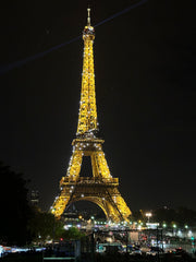 The Eiffel Tower lit at night | Paris: A self-discovery adventure