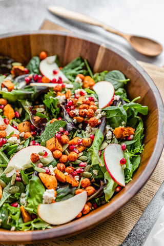 Bowl of salad with chickpeas on top