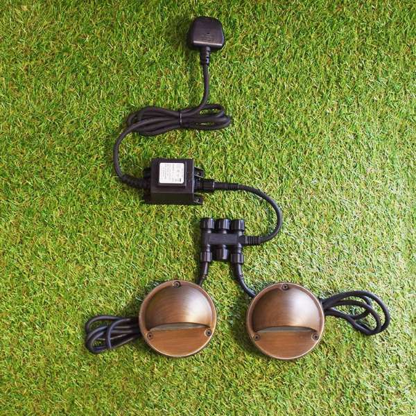 Lumena 12v Plug and Play garden lighting system with low voltage outdoor transformer, cables, connectors with VERSA 12v plug and play garden lights.