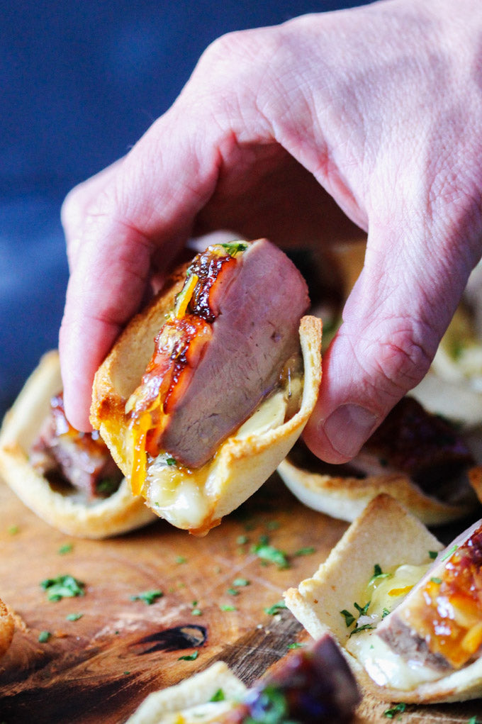 Bouchées de canard à l'orange infusées au thé et au brie