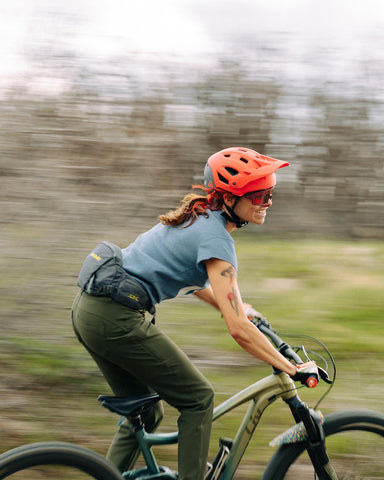 A woman riding a bike