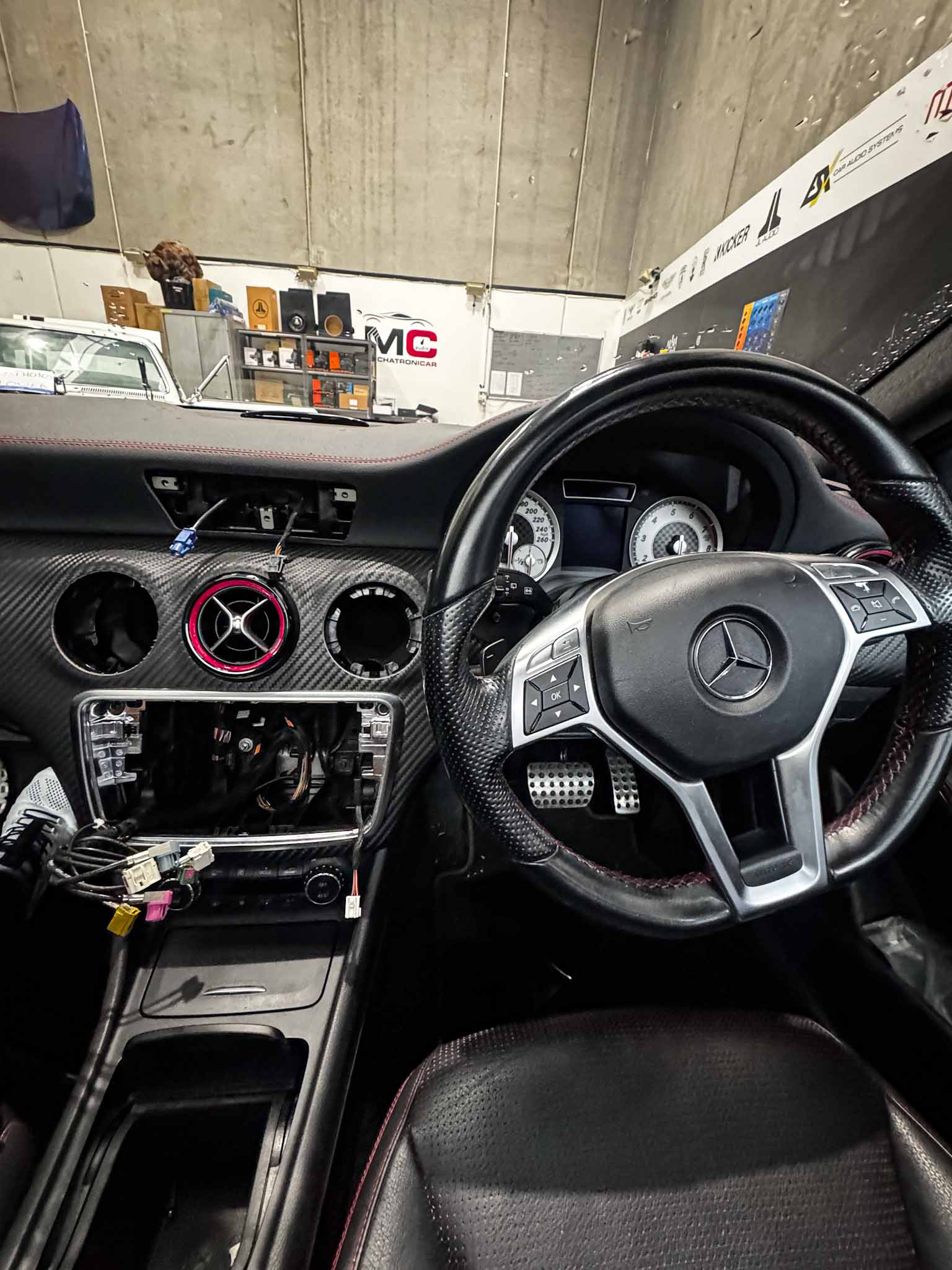 MC Audio Sydney technician installing CarPlay module