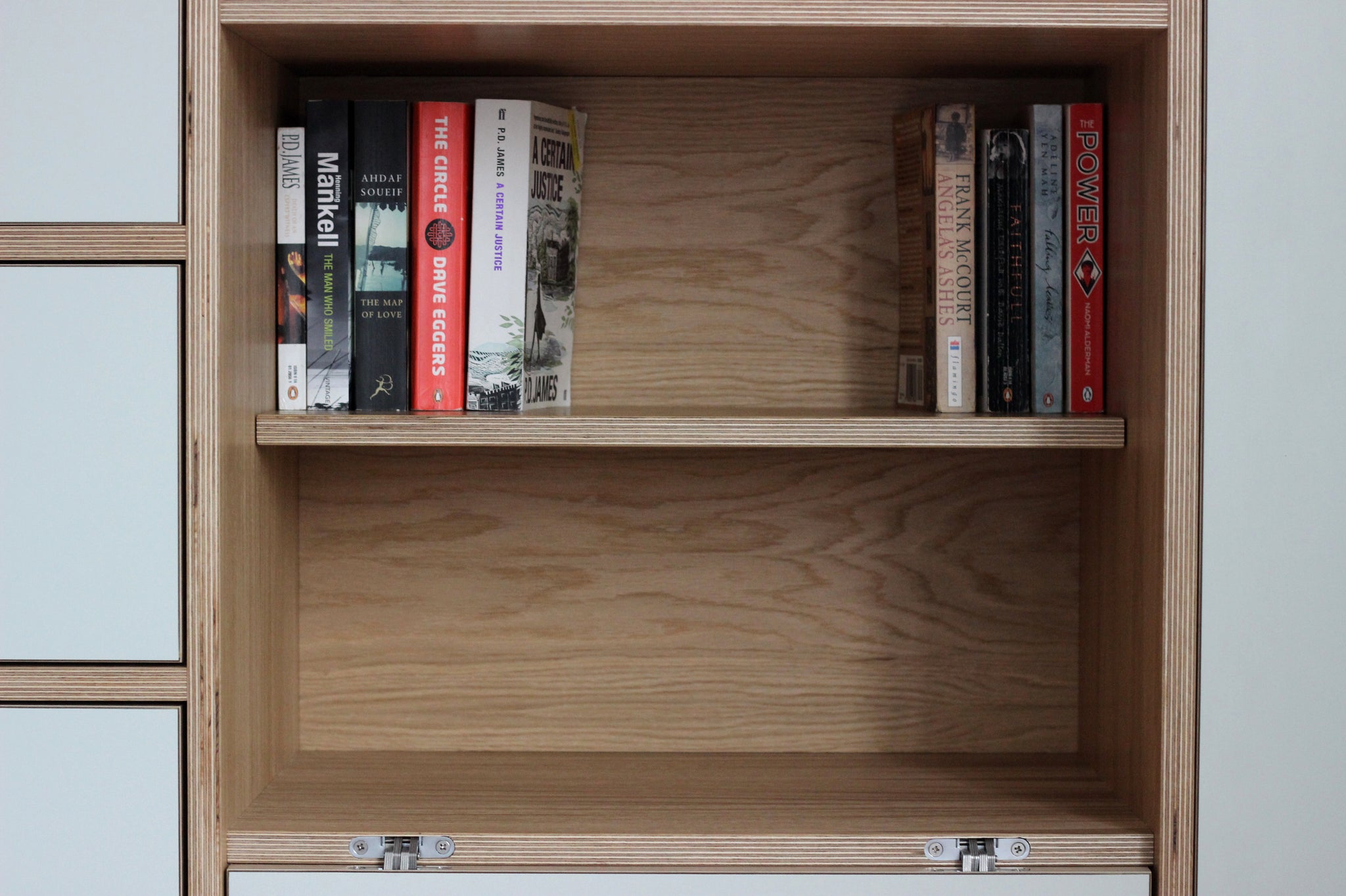 Bespoke oak veneer & plywood wardrobe shelving unit. Made by Jon Grant London.