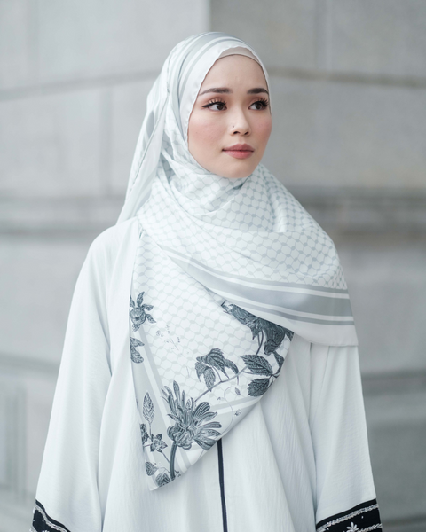 Model wearing White Ghutra shawl in exclusive navy floral design