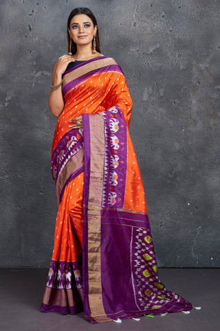 Orange Ikkat Silk Saree with Purple Zari Border