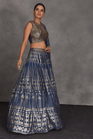 Shop blue sequin embroidery designer lehenga online in USA with dupatta. Flaunt your Indian style on festive occasions in stunning designer lehengas, Anarkali suit, sharara suits, designer gowns, designer sarees, embroidered sarees from Pure Elegance India fashion store in USA. -side